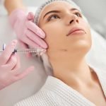 young woman getting cosmetic injection
